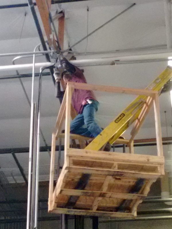 Worker falls from forklift